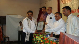 Career Guru Receiving Award by Padmashree Dr. Vijay Bhatkar